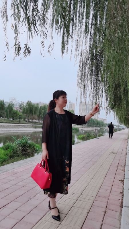 周本玲的第一张照片--廊坊相亲服务中心